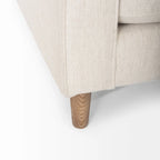 Divano a 3 posti in tessuto color crema con cuscini cilindrici e gambe in legno
